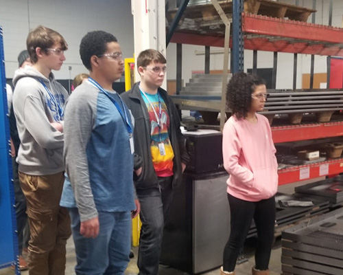 students on manufacturing tour